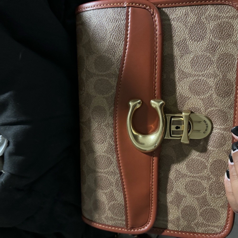 Coach Signature Canvas Shoulder Bag in Brown and Saddle